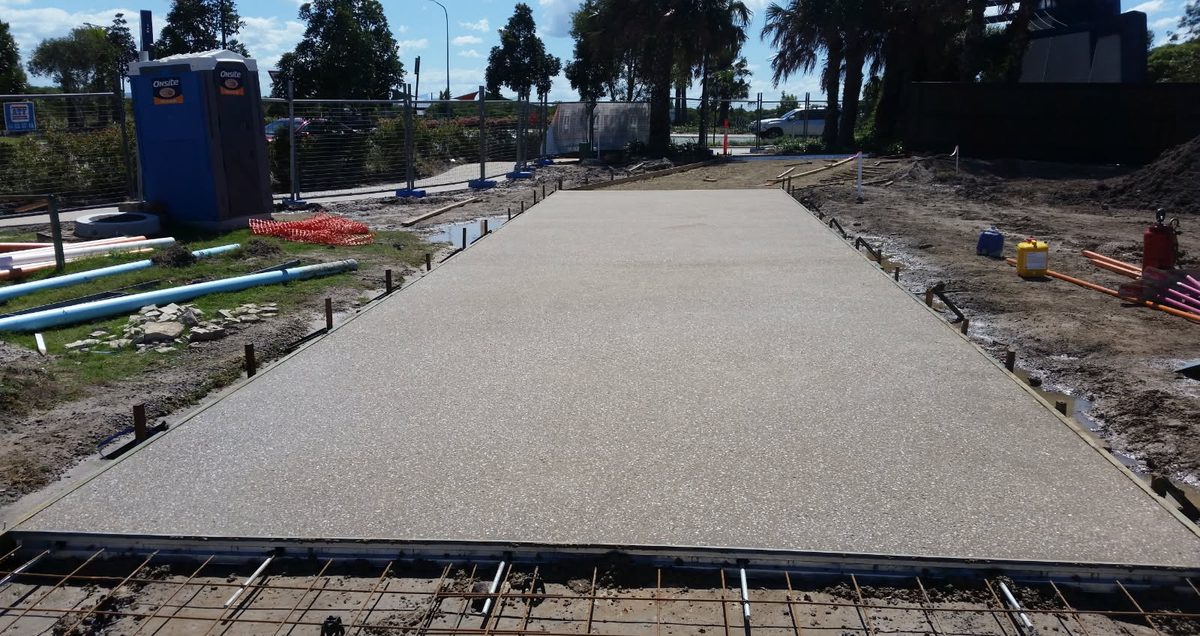 Washed exposed aggregate concrete panel with formwork still on